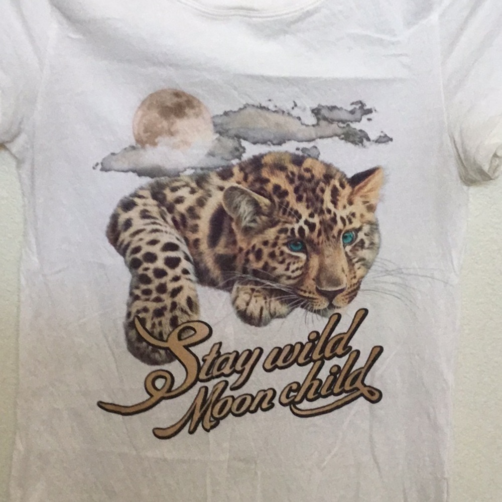 Spell “stay wild moon child” tee